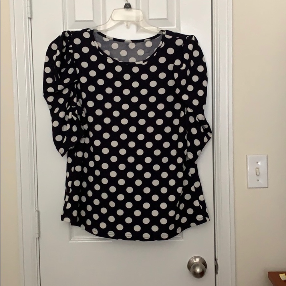 Polka dotted puff sleeved blouse